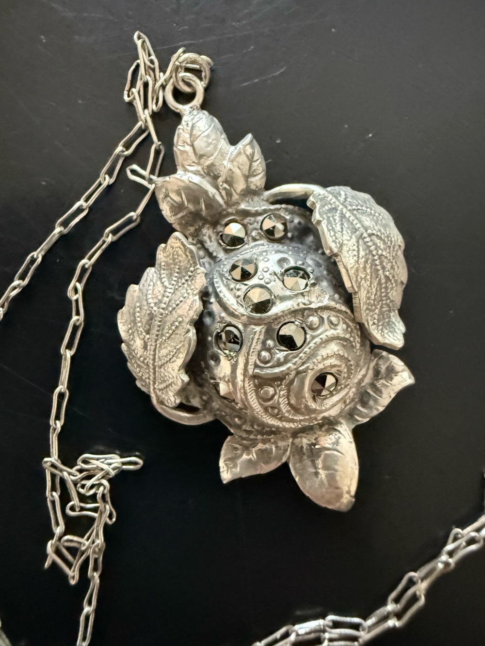 Silver Floral Leaf Pendant Necklace with Faceted Accents